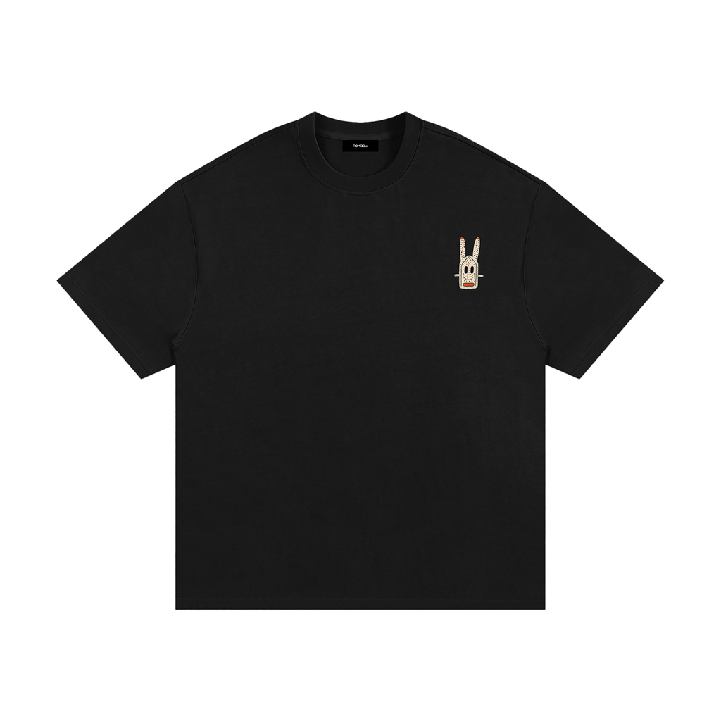 Unisex Onyx heavyweight T-shirt with small Dogon Rabbit chest graphic in cultural fusion style.