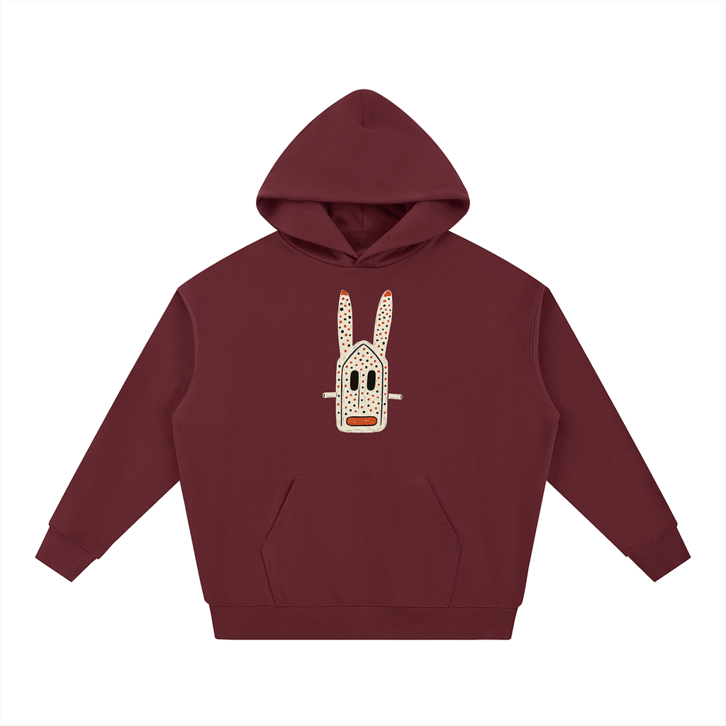 nomad_07 unisex Crimson heavyweight hoodie with Dogon Rabbit graphic front view