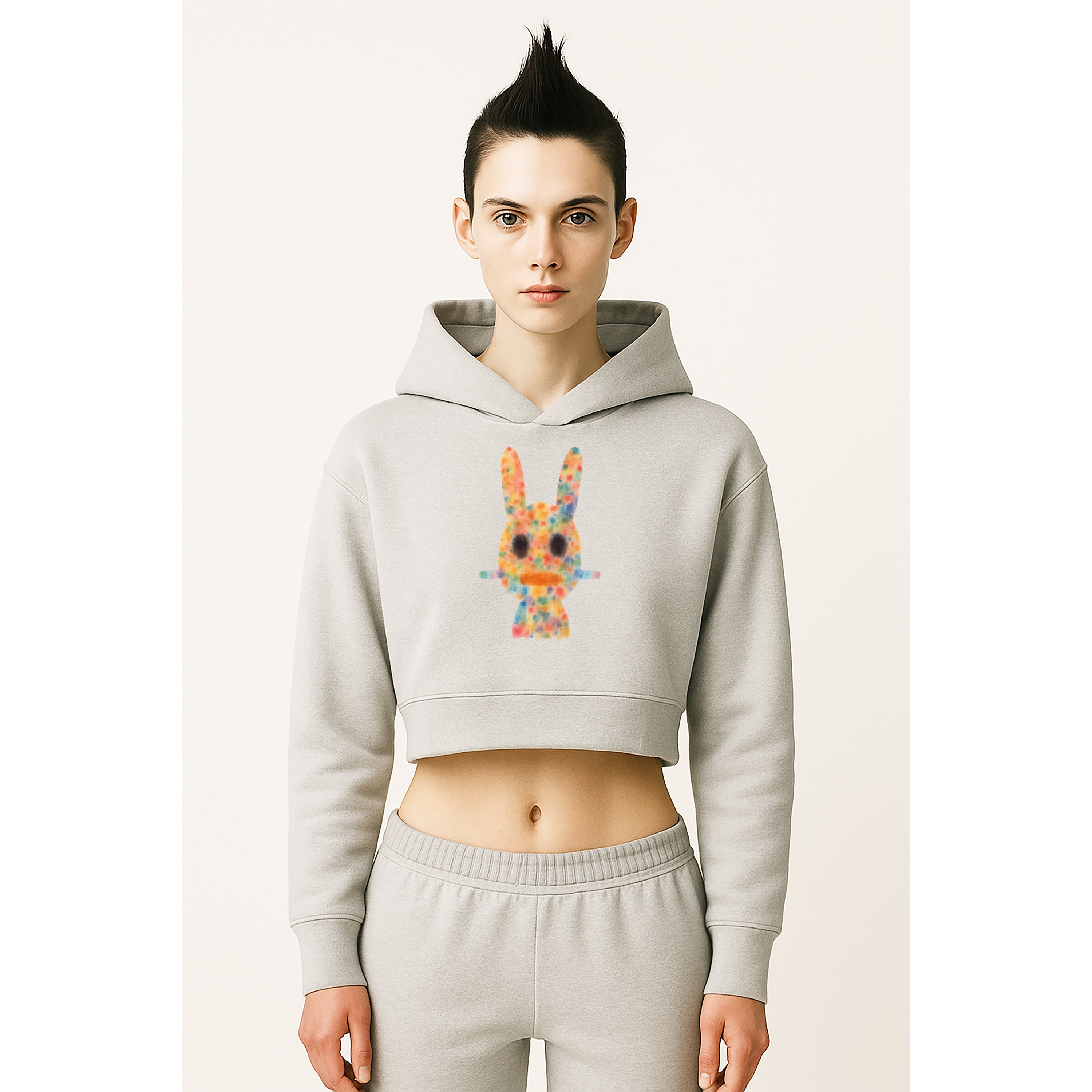 Model wears heather grey watercolor ink drip dogon mali hoodie