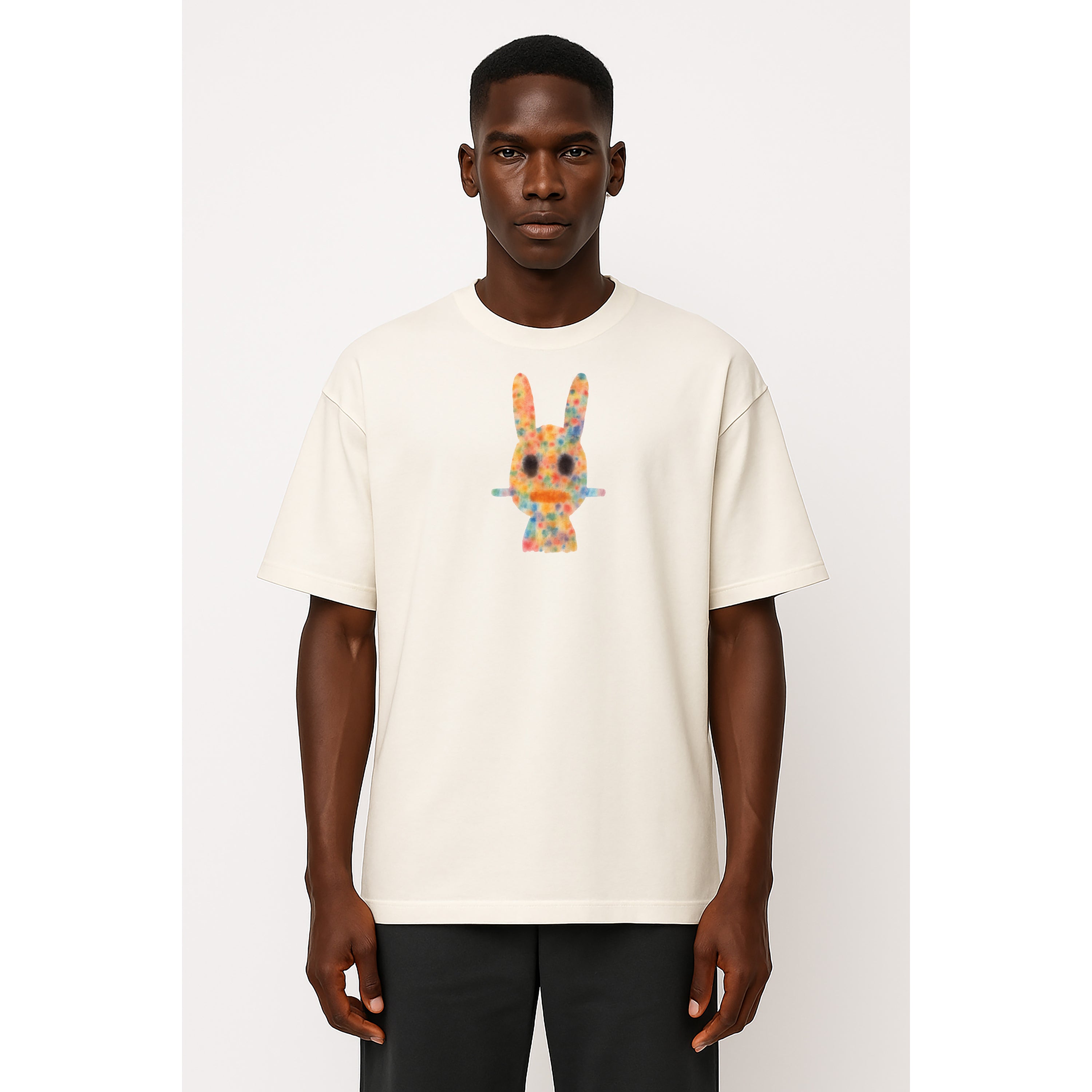 Model wears white oversized heavyweight tee with dogon bunny graphic in watercolor ink drips