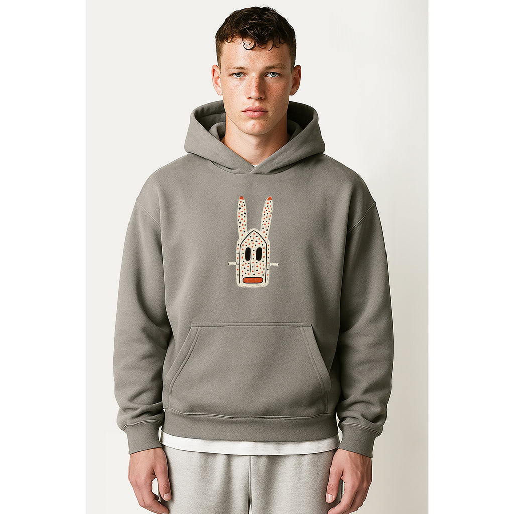 model wearing nomad_07 unisex Ash Grey heavyweight hoodie with Dogon Rabbit graphic front view