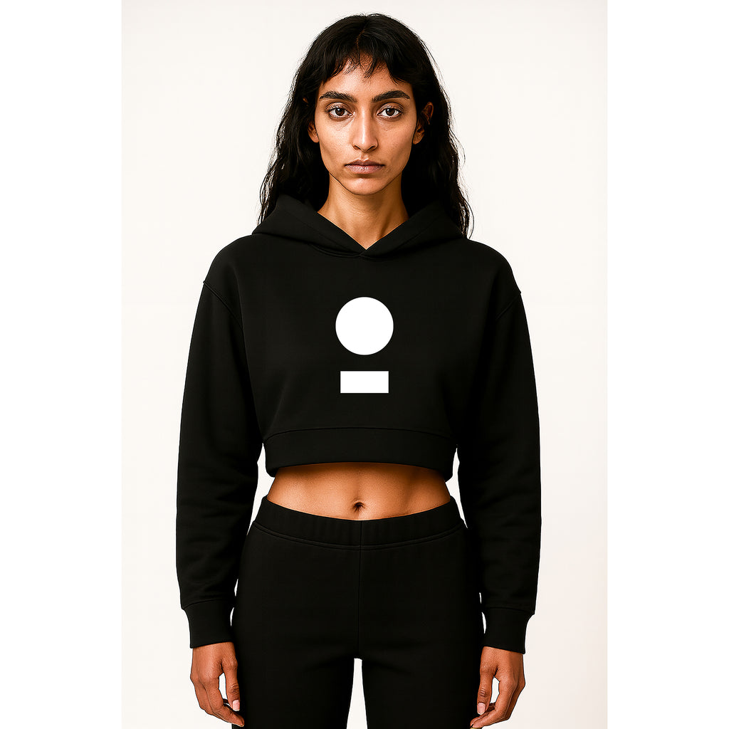 Model facing forward wearing nomad_07 women's cropped streetwear hoodie in Onyx with core logo front view