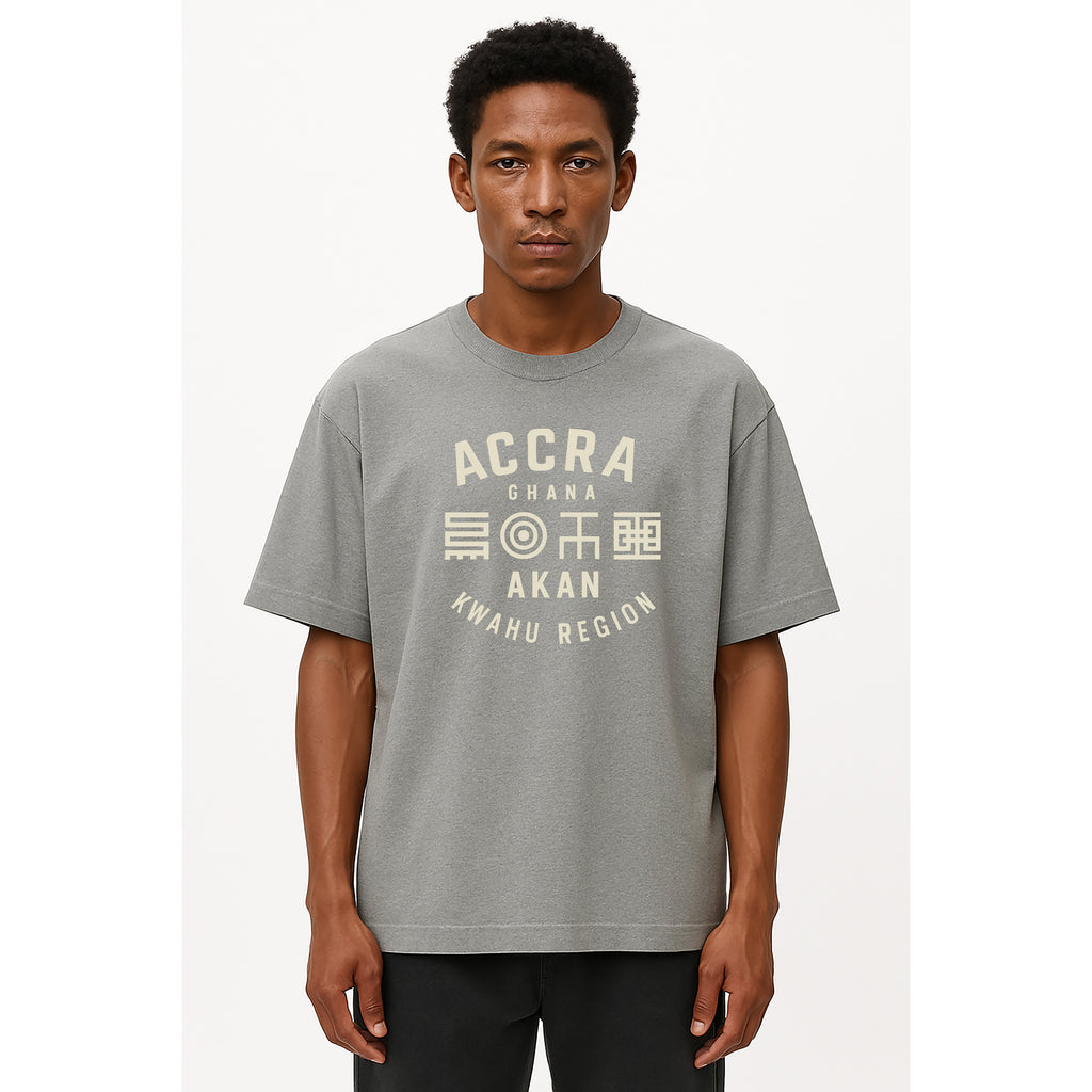 Model wears Akan Script Heavyweight Tee in Smoke Clay with Stone print, oversized unisex fit