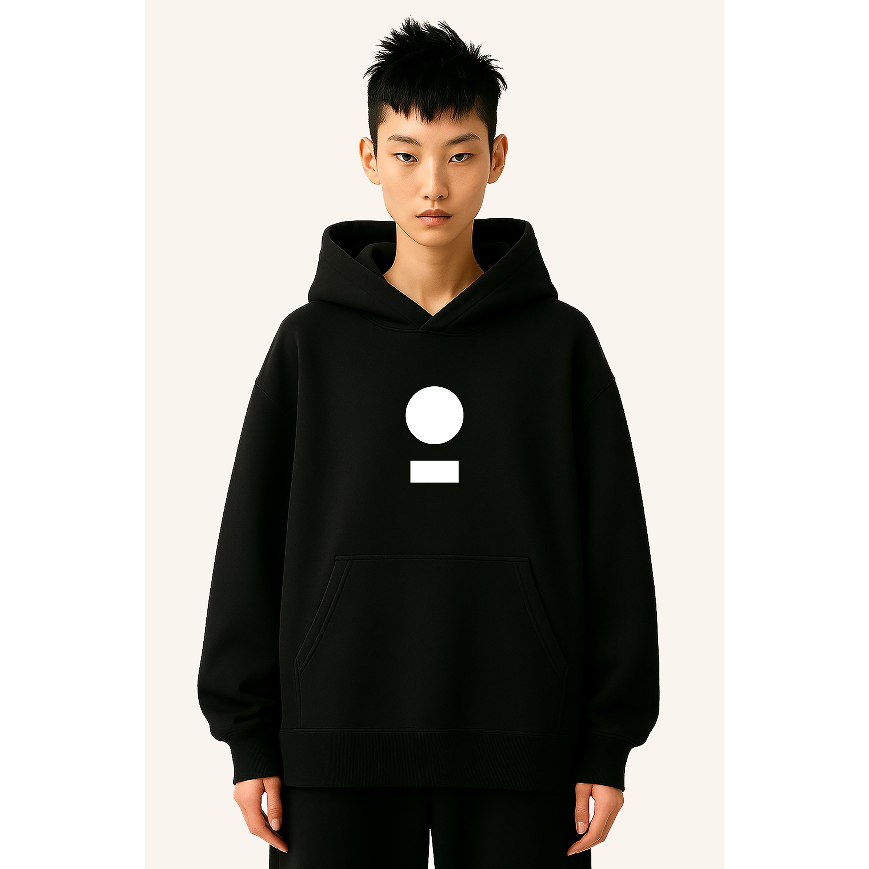 Model wears nomad_07 unisex streetwear heavyweight hoodie in Onyx with core logo front view in white