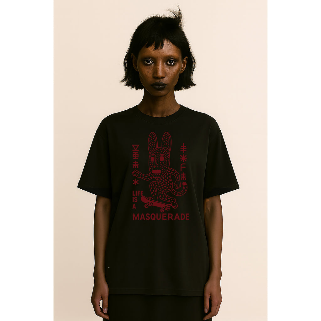 A model wears nomad_07 Masquerade_07 heavyweight tee in Onyx with Crimson Dogon-inspired graphic