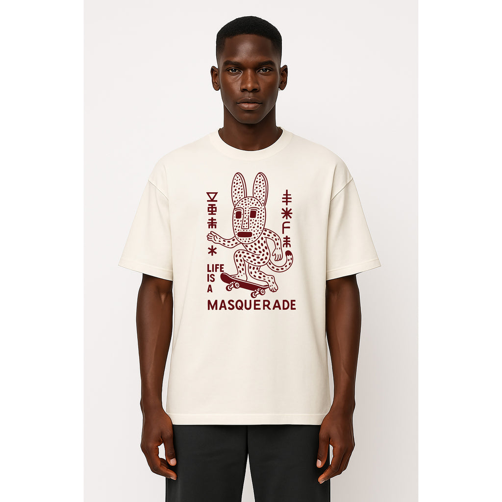 Model wears nomad_07 Masquerade_07 heavyweight tee in Chalk with Crimson Dogon-inspired graphic