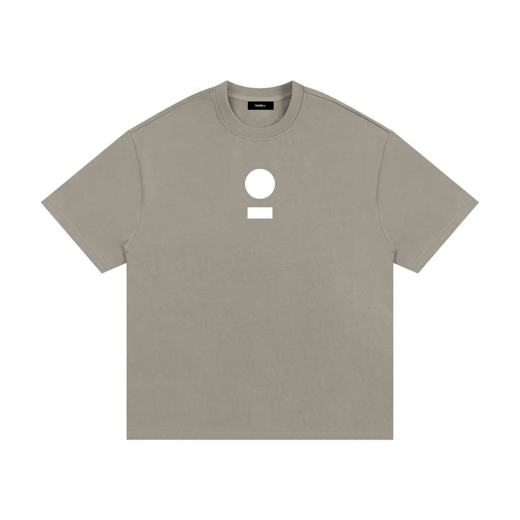 nomad_07 Logo Heavyweight Tee in Dark Clay with centered core logo, oversized unisex fit.